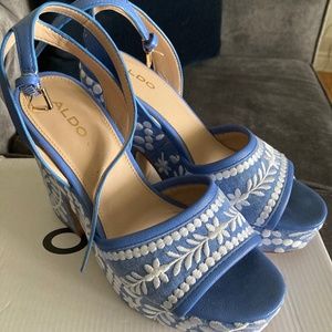 Blue and white Aldo sandals